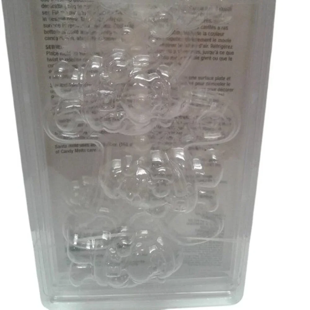 Wilton Christmas 3-Piece Candy Mold Set Snowflakes Gingerbread Men Santa Shapes